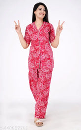 Women's printed rayon night suit top and pajama set, short-sleeved, colorful pattern on display